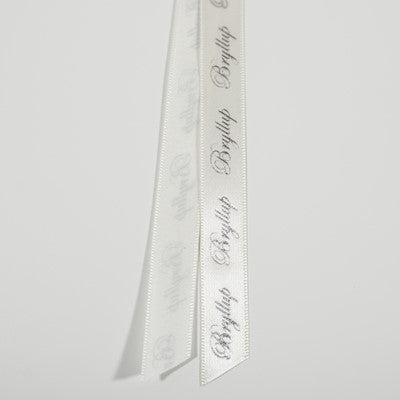 Bånd med tekst kremfarget med sølvtekst " bryllup " 13mm