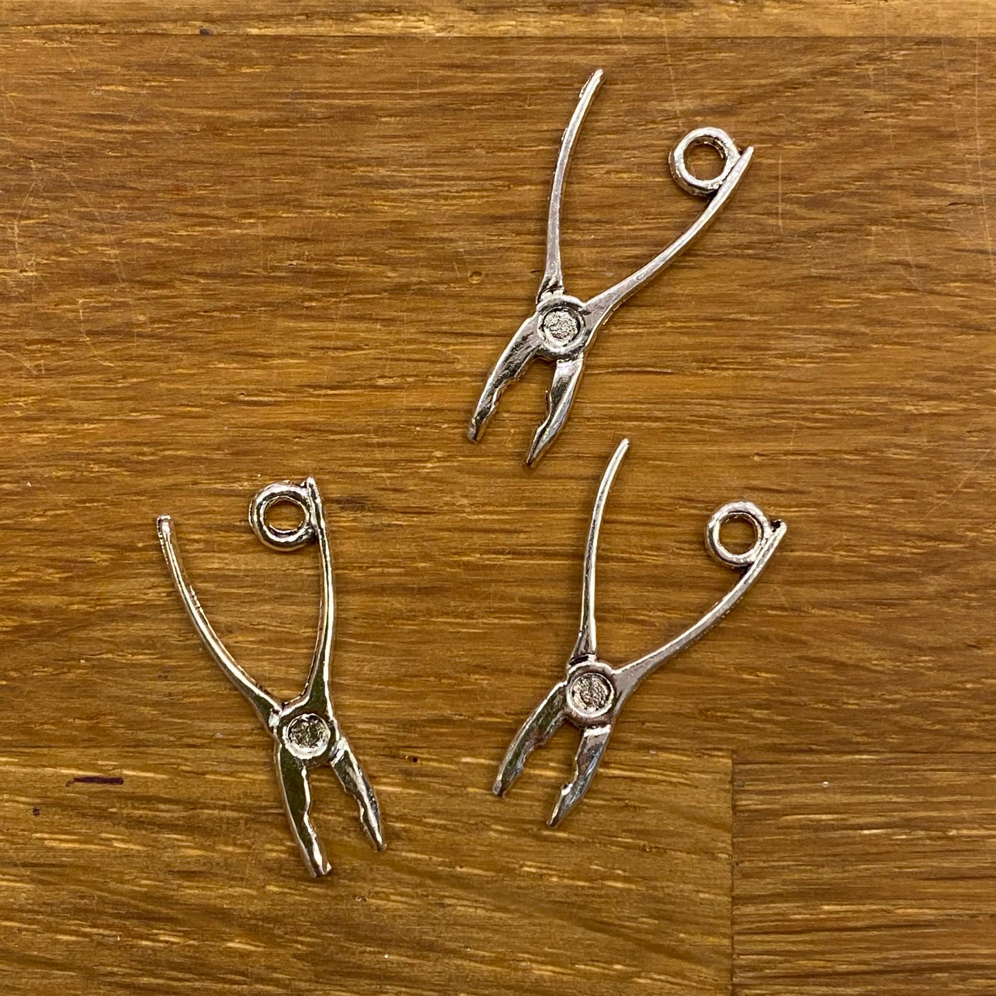 Charms tang 12 stk pr pk