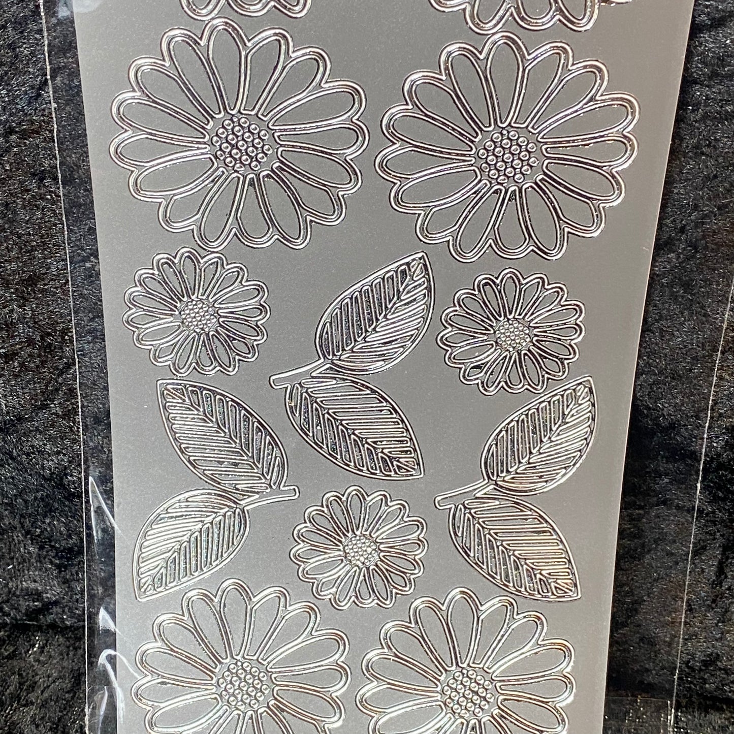 Klistremerker blomster sølv