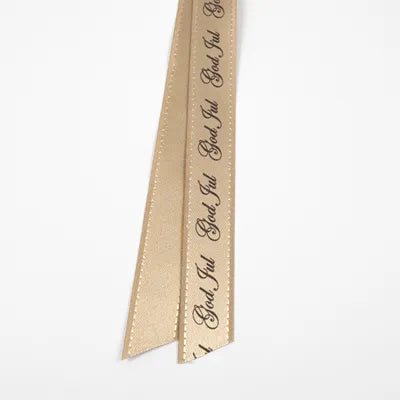 Bånd med tekst beige med brun tekst God Jul,  bredde: 16mm