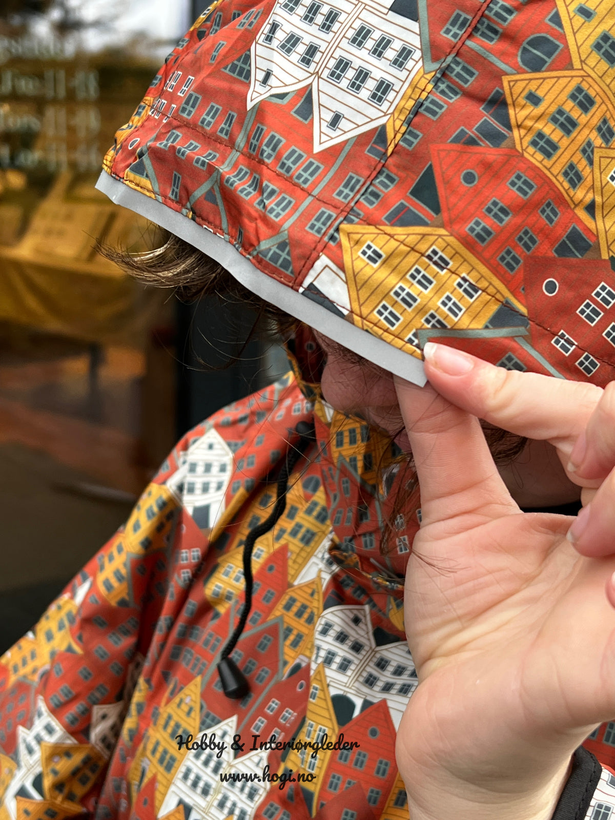 Poncho m/ refleks, lomme med nøkkelhank