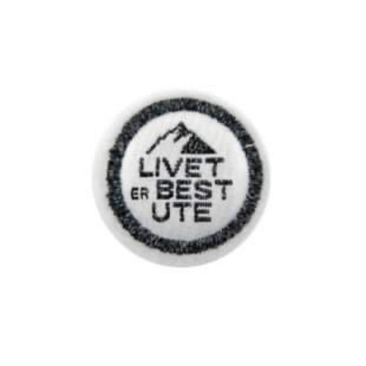 Kort & Godt symerke med refleks: "Livet er best ute"