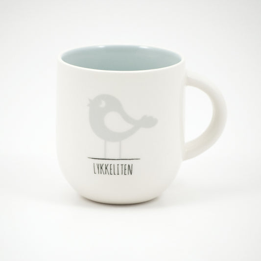 Kopp porselen Hvit med tekst: Lykkeliten lys blå Motiv: se bildet.